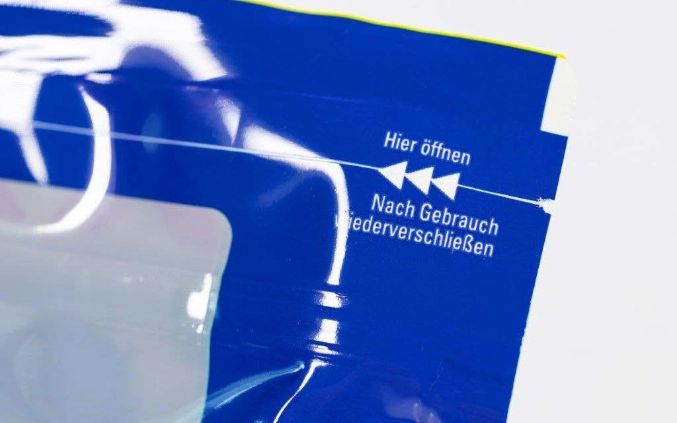 Scored line by laser for easy opening 